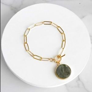 Boutique Link Bracelet with hanging neutral medallion. Brand new in bag w Tag